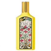 Gucci Flora Gorgeous Orchid Eau de Parfum 100ml in a vibrant yellow bottle with floral label, luxury fragrance for women.
