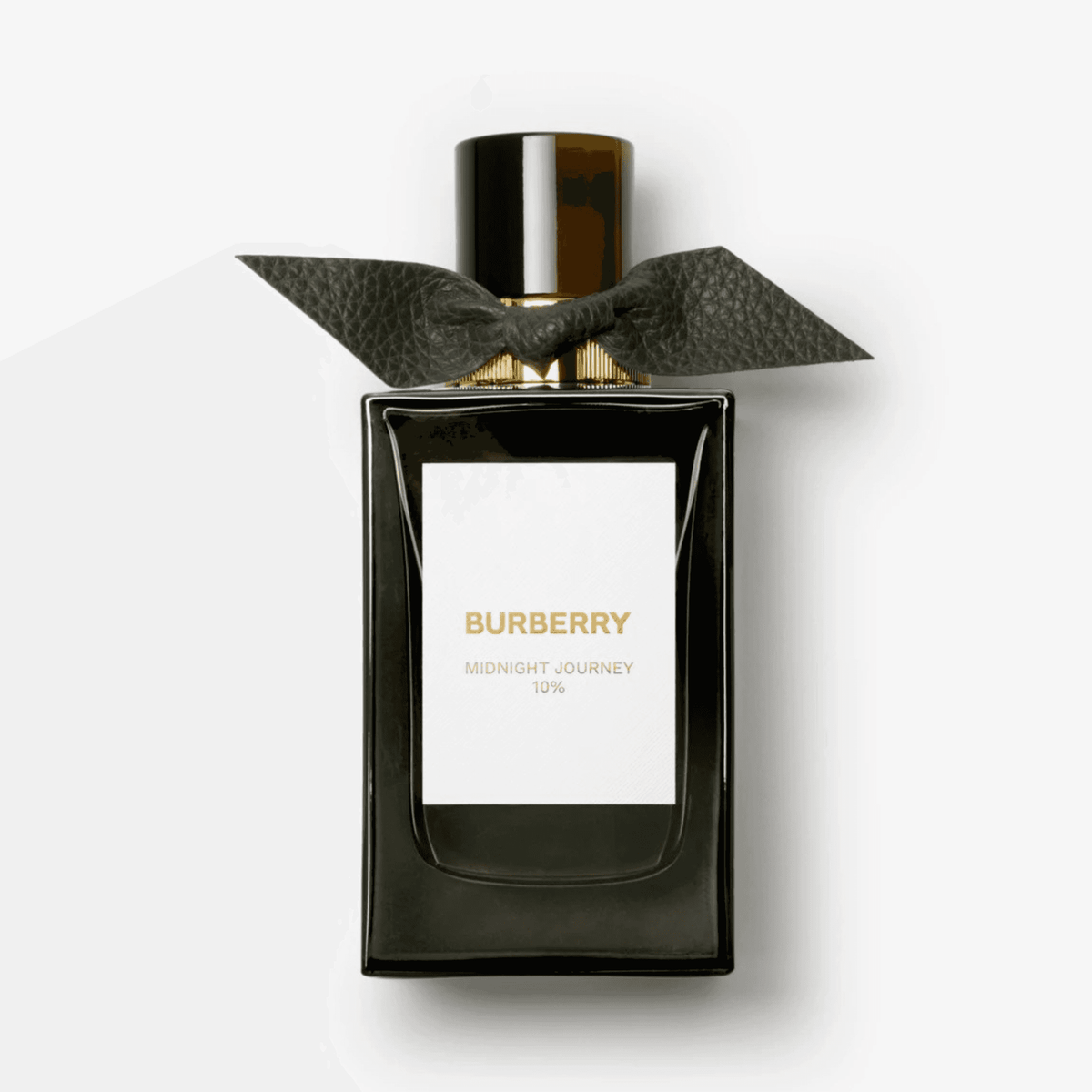 Burberry Midnight Journey EDP 100ml in a sleek dark glass bottle with gold accents and a textured black bow, ideal for unisex fragrance lovers.