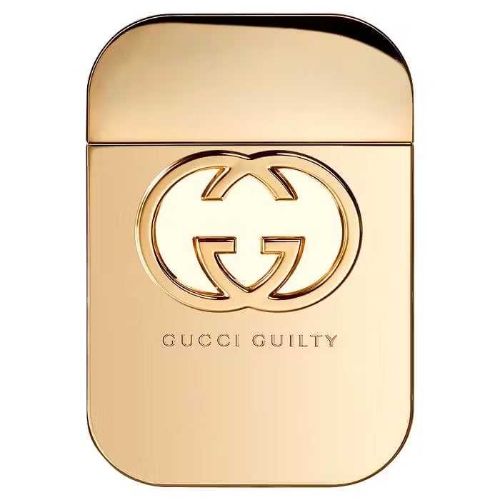 Gucci Guilty Women Eau de Toilette 75ml in a sleek gold bottle with iconic interlocking G logo, ideal for luxury fragrance lovers.