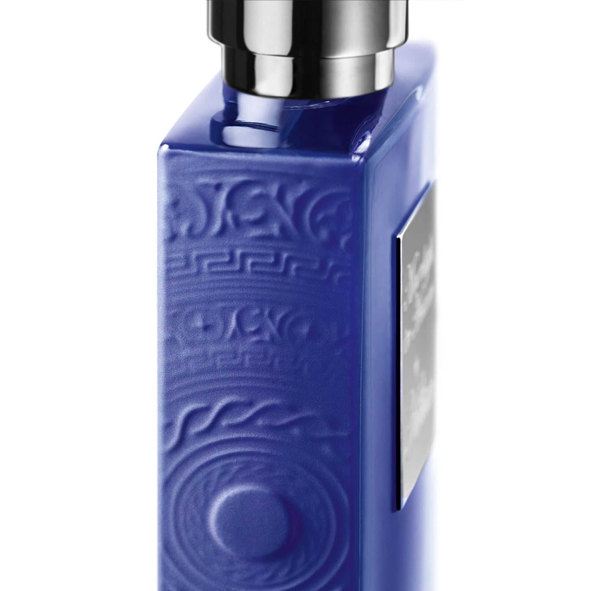 Close-up of Imperial Tea by Kilian – Eau de Parfum (50ml) showing embossed detailing on the side of the blue glass bottle, highlighting premium design.